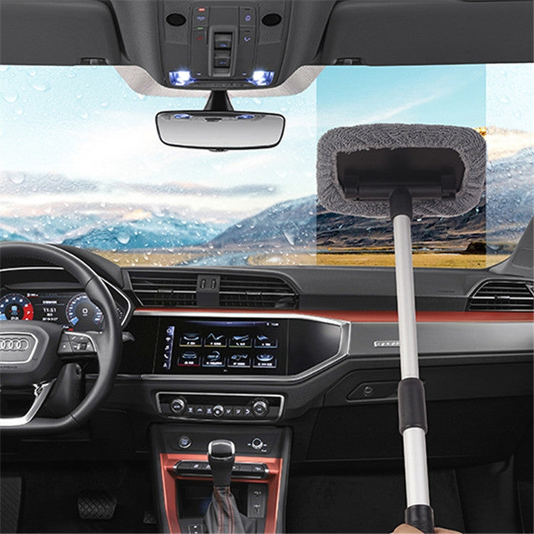 Windshield cleaning brush reaching forward with gray microfiber wipe pad