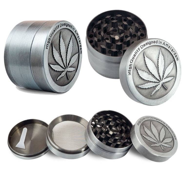 Stainless steel herb grinder with maple leaf design, stacked grinder components and lids