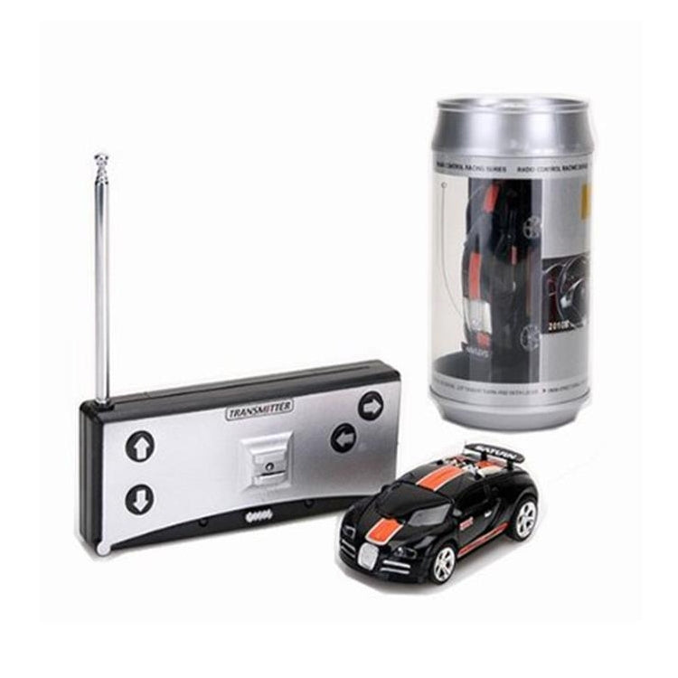 Mini RC car set with remote control, black car with orange accents and transmitter
