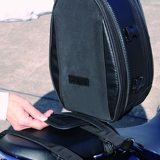 Waterproof motorcycle bag close-up showing adjustable strap and buckle