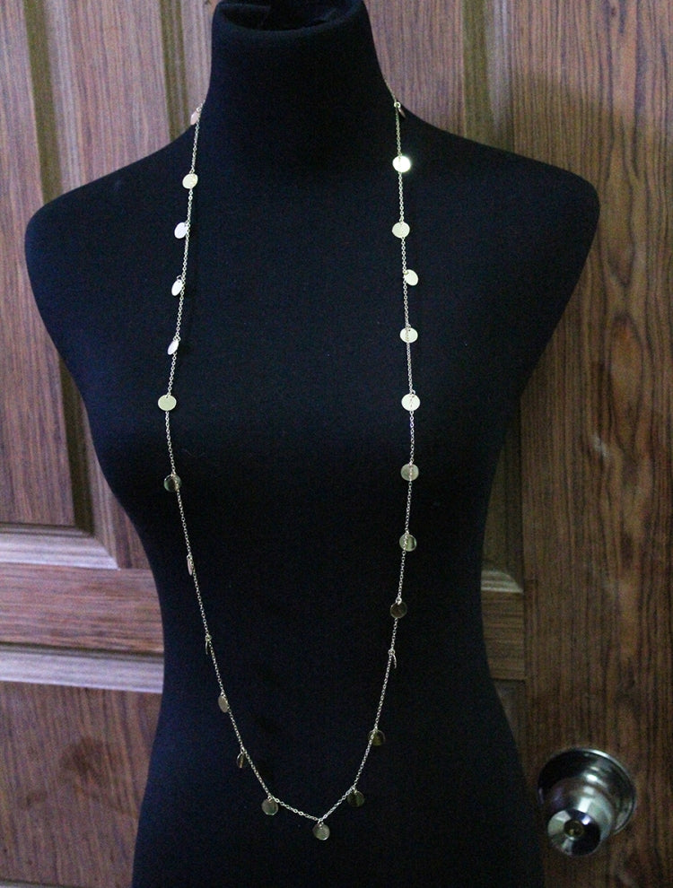 Gold-tone long necklace with round disc pendants on a fine chain