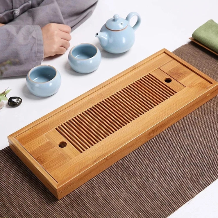 Bamboo tea tray with slatted drain grate and two round holes