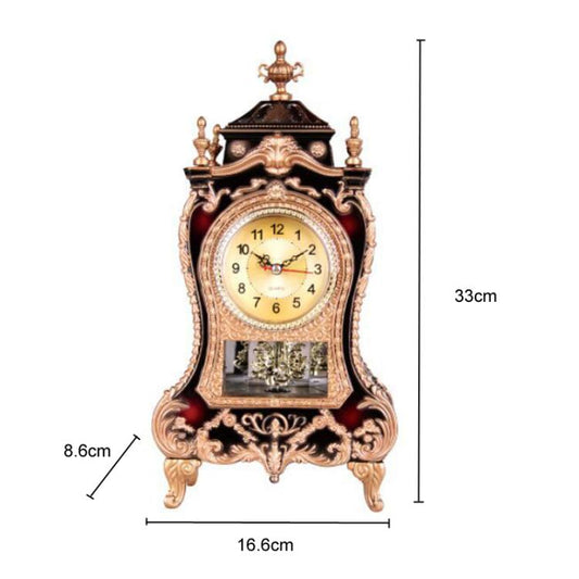 Ornate decorative pendulum clock with dark body, gold trim, and cream dial (size shown)