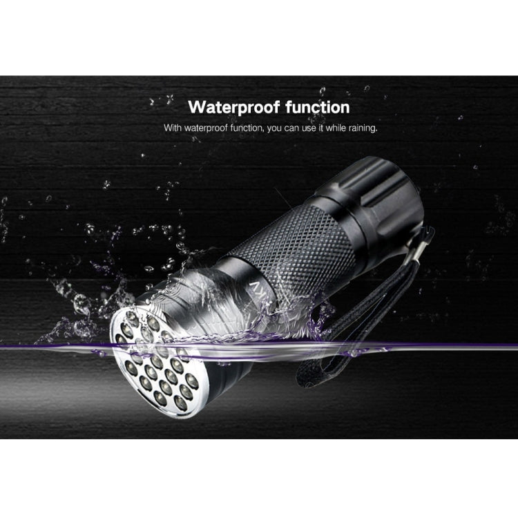 Black UV LED flashlight with water splash effect near the front 21-LED head.
