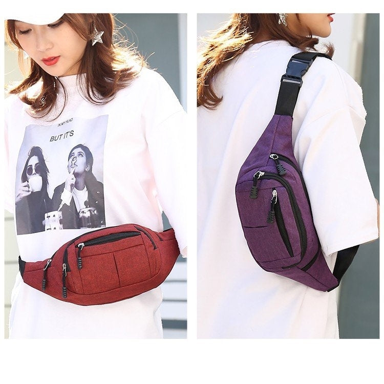 Waist bags worn on model: purple crossbody bag and red fanny bag
