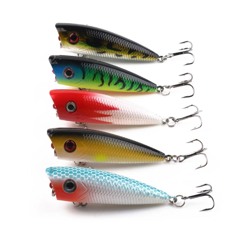 Angled lineup of five hard fishing lures with treble hooks, blue, red, green, and yellow bodies