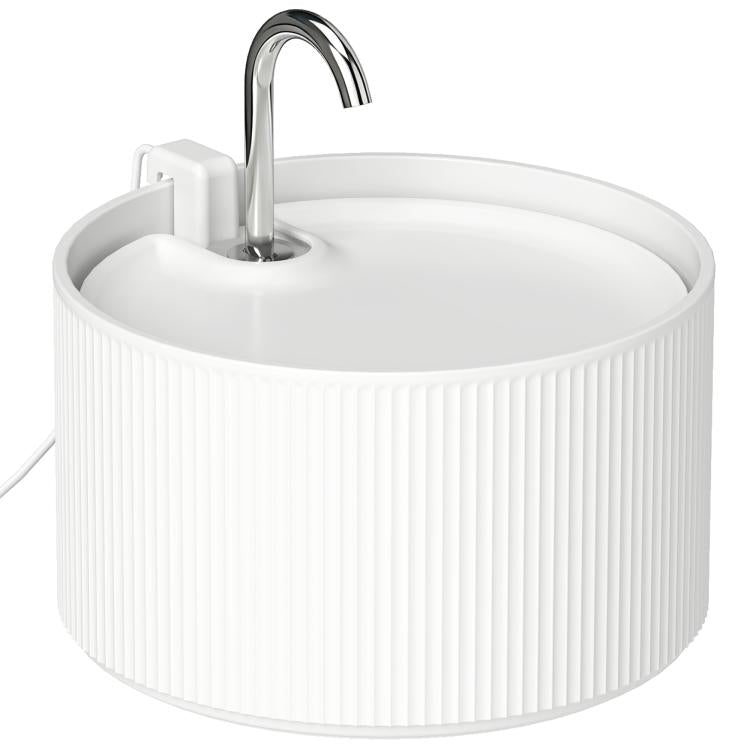 White ceramic cat water fountain with chrome faucet, round ribbed basin filled with water