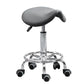Gray saddle seat rolling stool with chrome pedestal and casters