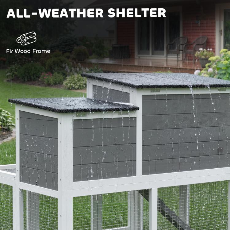 Weather-sheltered 2-story rabbit hutch with hinged black roof and wire side panels