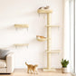Beige wall-mounted cat tree with three wall platforms, hammock bed, and upright scratching post
