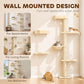 Beige wall-mounted cat tree with stacked platforms, hammock bed, and hanging ball