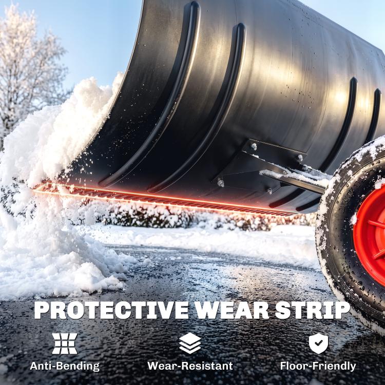 Close-up of black snow pusher blade with protective wear strip and red wheel