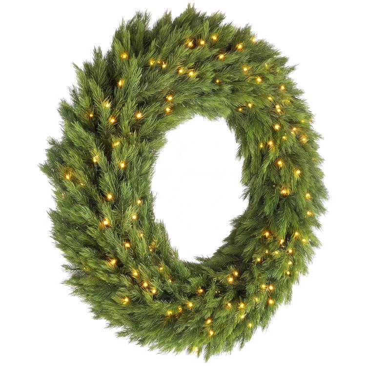 Green artificial Christmas wreath with warm LED lights across the full circular shape.