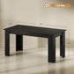 Rectangular black dining table with 63-inch length and straight leg frame