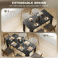Rectangular dining table with black top and seating setup for multiple guests