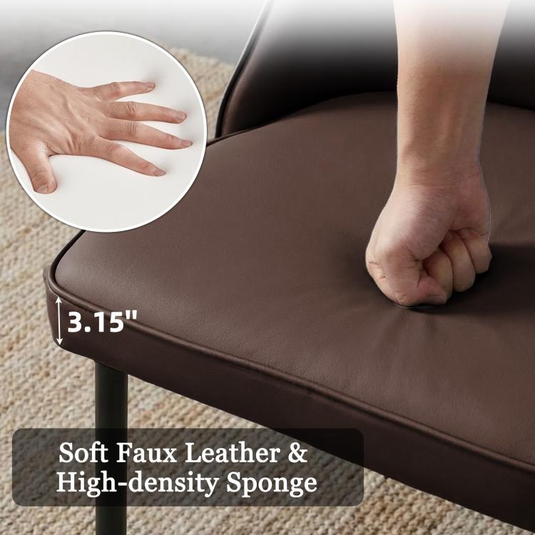 Close-up of brown faux leather chair seat with cushioned edge and metal leg