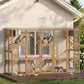 Outdoor wooden cat enclosure with multiple levels, rope bridges, and mesh viewing panels; cats.