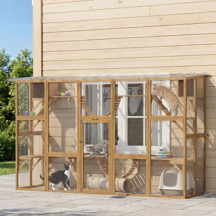 Wooden outdoor cat playhouse enclosure with mesh doors, ramps, and hanging rope bridge; cats.