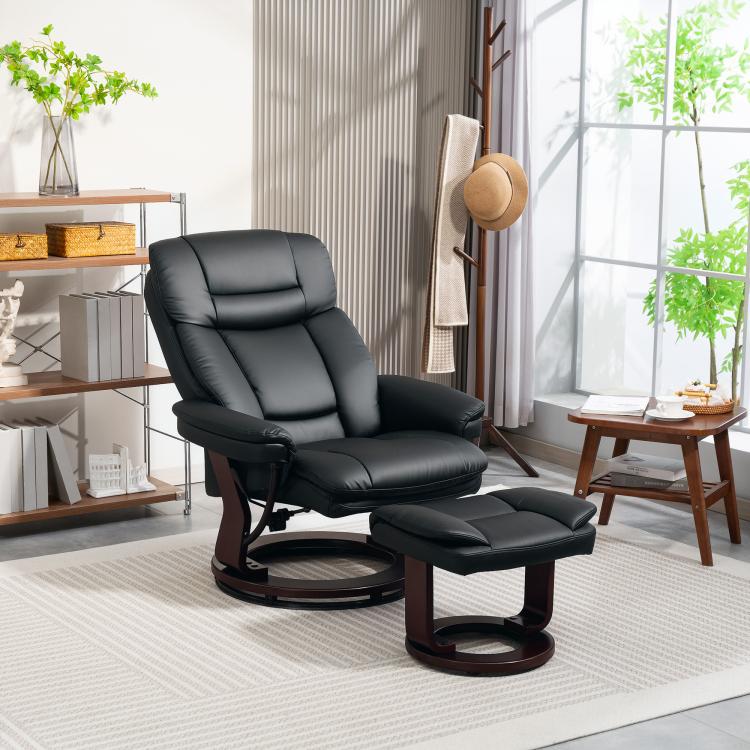 Black faux leather swivel recliner chair with ottoman footrest, living room view