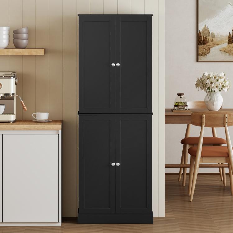 Black kitchen pantry cabinet with two upper doors and two lower doors, silver knobs