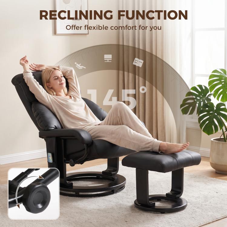 Black reclining massage chair with ottoman footstool extended for full leg support