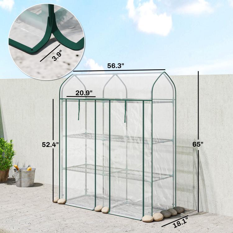 Clear mini greenhouse with green frame, arched transparent roof, and 3-tier wire shelves