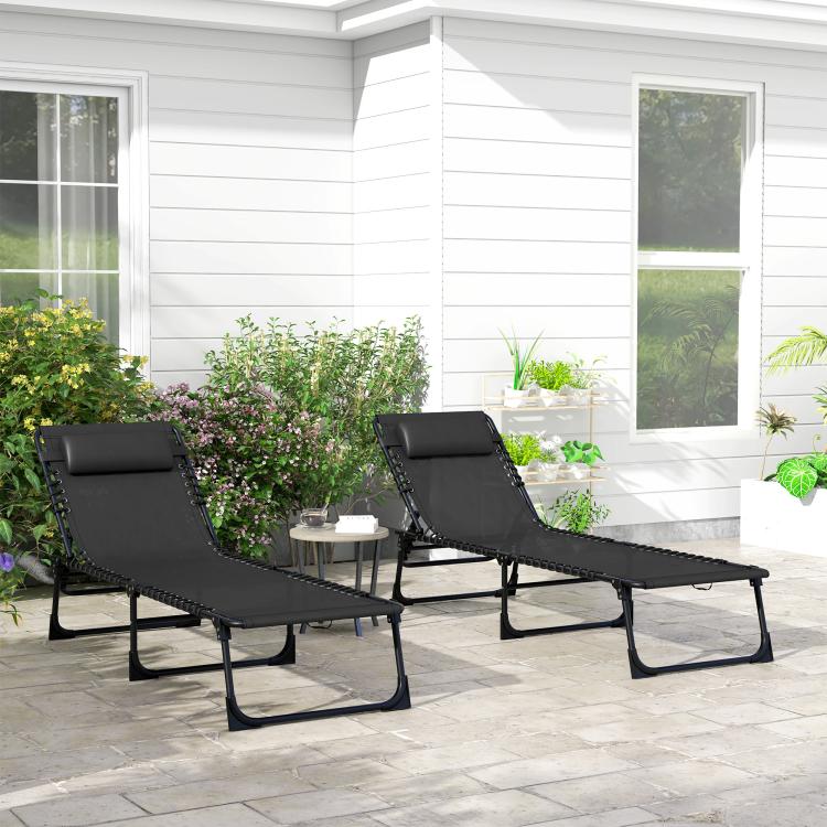 Pair of black reclining chaise lounge chairs with mesh fabric and foldable steel frame
