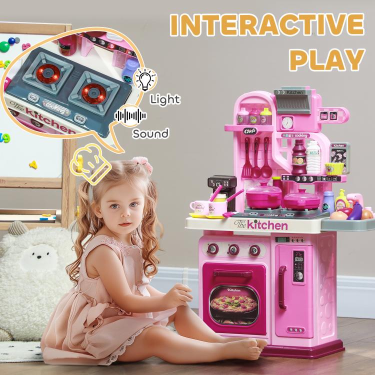 Pink kids play kitchen toy with light and sound control panel and pretend cooking setup