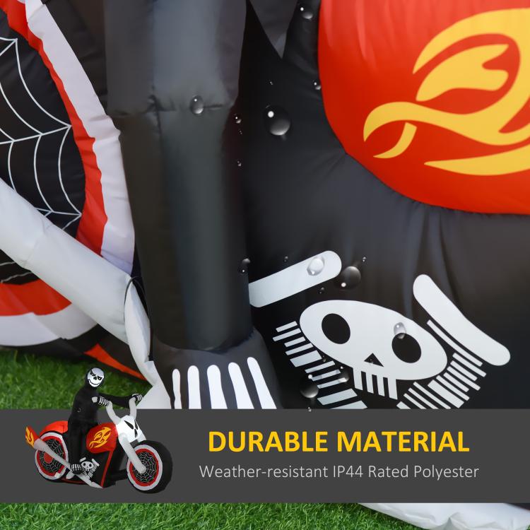 Inflatable grim ghost biker close-up: black suit with white skull graphic and red flame emblem