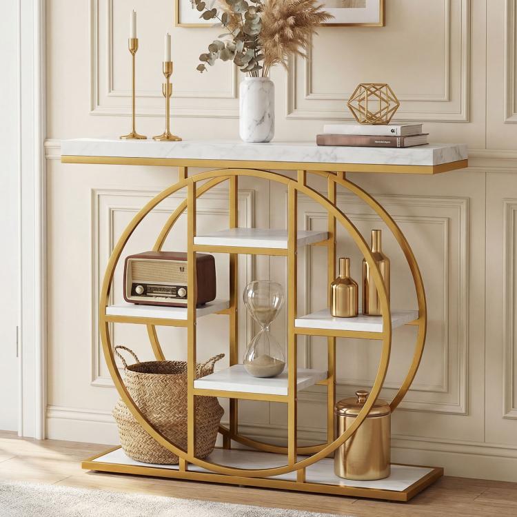 Marble-effect console table with circular gold frame and open storage shelves