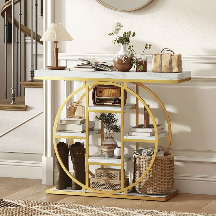 Marble-effect console table with circular gold frame and open storage compartments