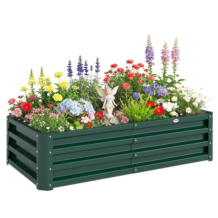 Green metal raised garden bed with slatted sides, filled with colorful flowers and herbs