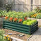 Green metal raised garden bed with slatted sides, filled with tomato plants and leafy greens