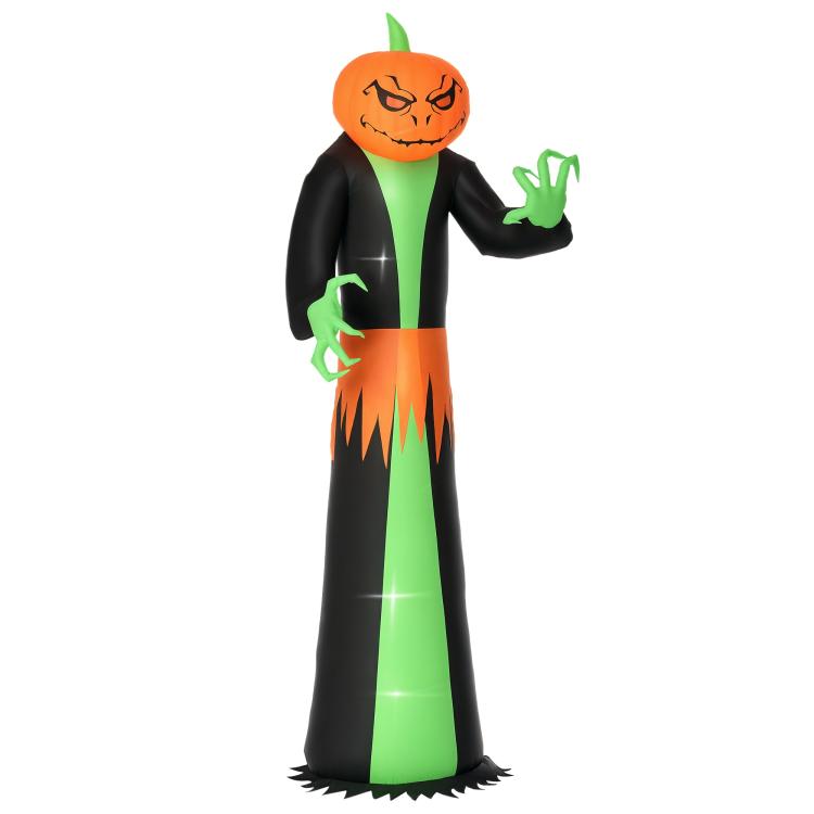 Inflatable pumpkin-head ghost yard decoration with green hands and smiling jack-o’-lantern face