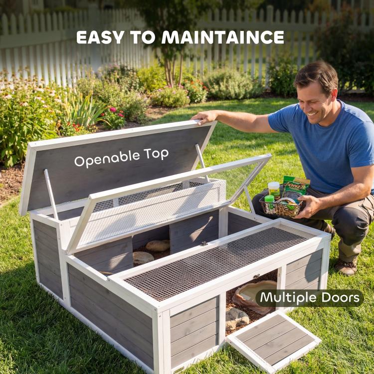 Wooden tortoise enclosure with openable top and multiple front doors for easy access