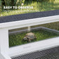 Tortoise enclosure clear viewing window in white frame with dark gray inner opening