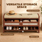 Brown shoe storage bench with cushioned seat, two pull-out drawers, and open shoe shelf