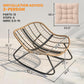 Woven rattan rocking papasan chair with cream cushion and arched metal frame