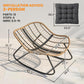 Oversized rocking chair with dark gray cushion, woven wicker frame, and black rockers