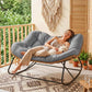 Gray papasan-style rocking chair with thick cushioned seat and black metal rocker base