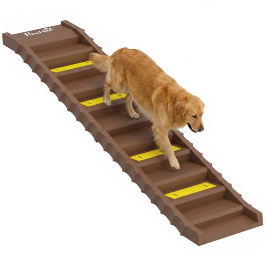 Brown foldable dog ramp with step treads and yellow non-slip strips, dog climbing up