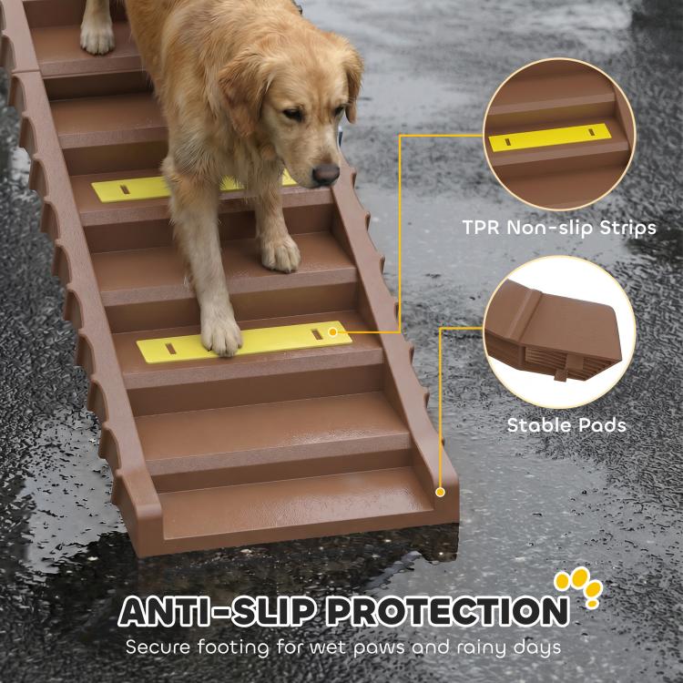Close-up of brown dog ramp steps with yellow anti-slip strips and textured stabilizer pads