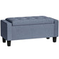 Dark gray tufted storage ottoman bench with hinged top and wooden legs