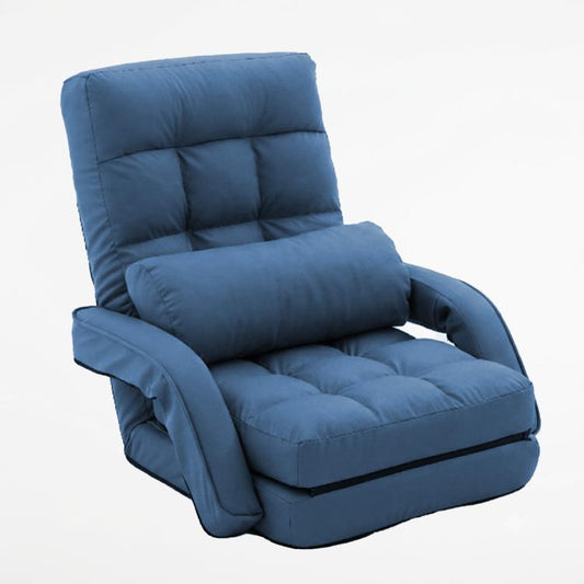 Blue padded floor lounge chair with tall backrest and curved armrests