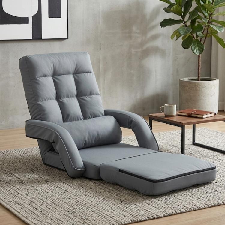 Grey padded folding lounge chair with tall backrest and extended chaise seat