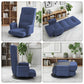 Blue swivel floor chair in a living room setting, folded-out recline view.