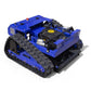 Blue remote-controlled crawler lawn mower with knobby track tires and exposed engine