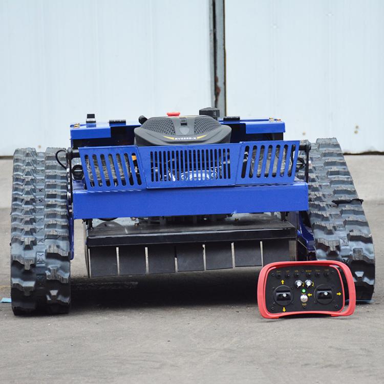 Blue remote-controlled crawler lawn mower with front cutting blades and control unit