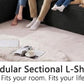 Black corduroy modular L-shaped sectional sofa with oversized chaise