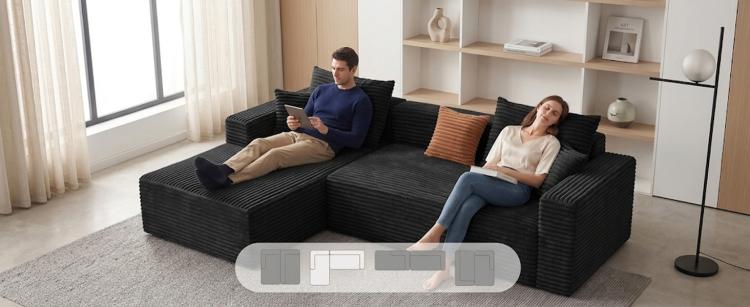 Black L-shaped sectional sofa with deep seats and plush cushioned arms